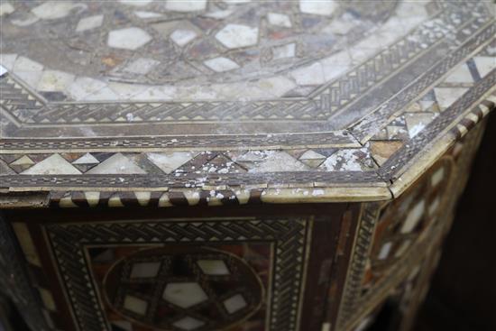 An Ottoman mother of pearl tortoiseshell and bone inlaid table W.53cm